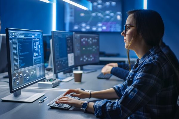 Smart,Young,Female,It,Programer,Working,On,Desktop,Green,Mock-up