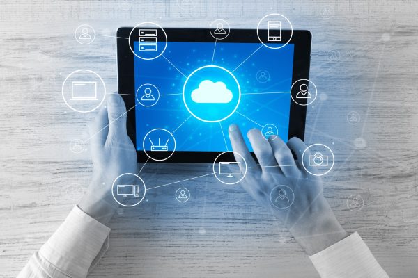 Hand,Touching,Tablet,With,Cloud,Computing,And,Online,Storage,Concept Hand,Touching,Tablet,With,Cloud,Computing,And,Online,Storage,Concept