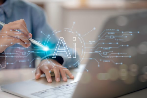 Artificial,Intelligence,Content,Generator.,A,Man,Uses,A,Laptop,To