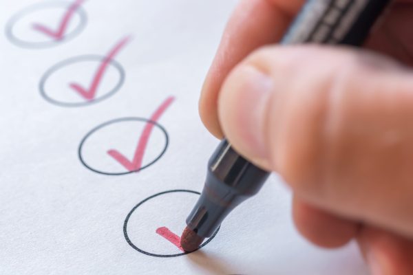 Checking,Completed,Tasks,On,A,List Checking,Completed,Tasks,On,A,List