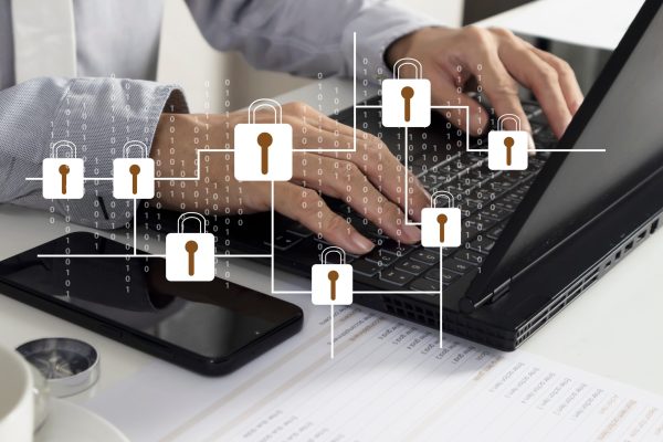 Businessman,Concept,Using,Secure,Labtop,To,Encrypt,Multiple,Accounts,And