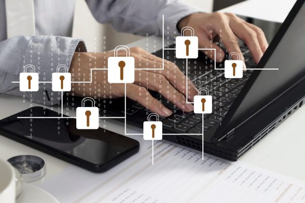 Businessman,Concept,Using,Secure,Labtop,To,Encrypt,Multiple,Accounts,And