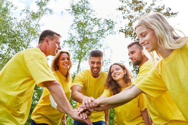 Young,People,In,Start-up,Team,Stack,Hands,In,A,Teambuilding