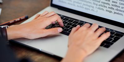 Stock,Photo,Of,Female,Hands,Touching,Keyboard,Of,Laptop,With