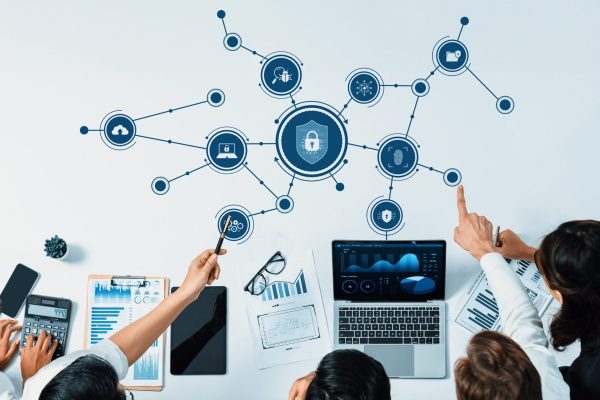 A,Diverse,Team,Collaborates,In,A,Modern,Office,,Analyzing,Cybersecurity