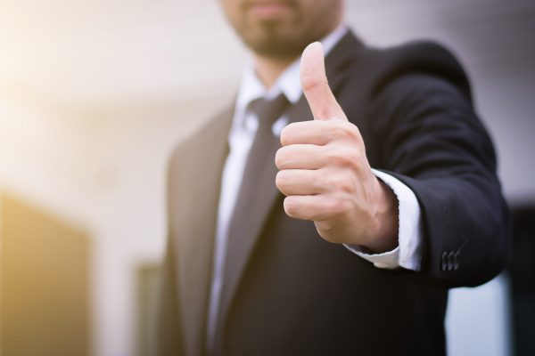 Businessman,Showing,Thumbs,Up,-,Closeup,Shot