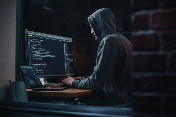 Night,Apartment:,Evil,Greedy,Hacker,Wearing,Hoodie,,Breaks,Into,Data