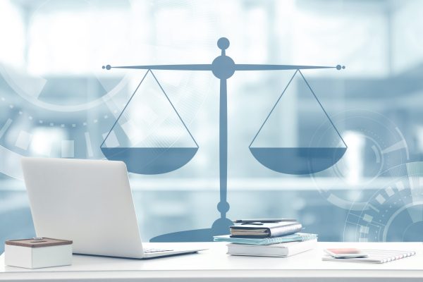 Law,Concept.,Lawyer,Workplace,With,Laptop,And,Scales,Of,Justice Law,Concept.,Lawyer,Workplace,With,Laptop,And,Scales,Of,Justice