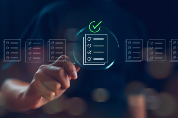 Women,Holding,A,Magnifying,Glass,,Showing,Audit,Document,Concept,quality,Assessment